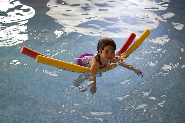little girl swimming for Recreational Therapy Treatment for spina bifida